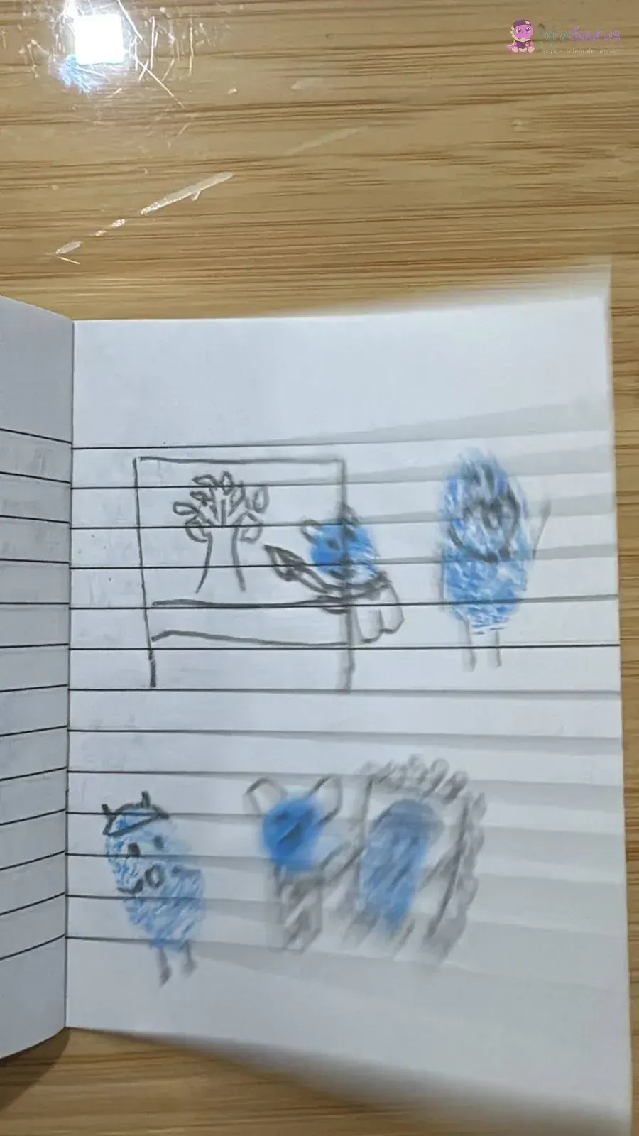 A blurry photo of a wordless page: a fingerprint dinosaur painting a tree on an easel and another looking in a mirror.